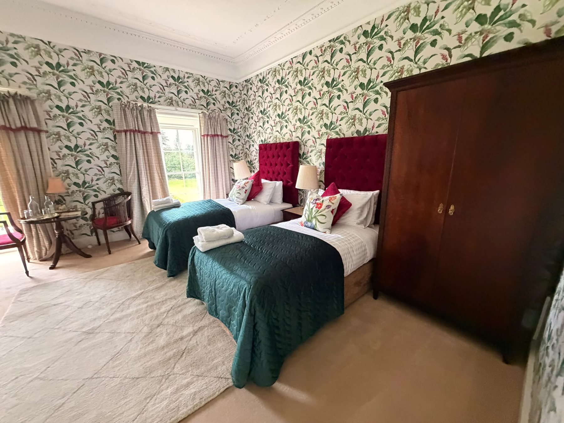A twin bedroom in the main house